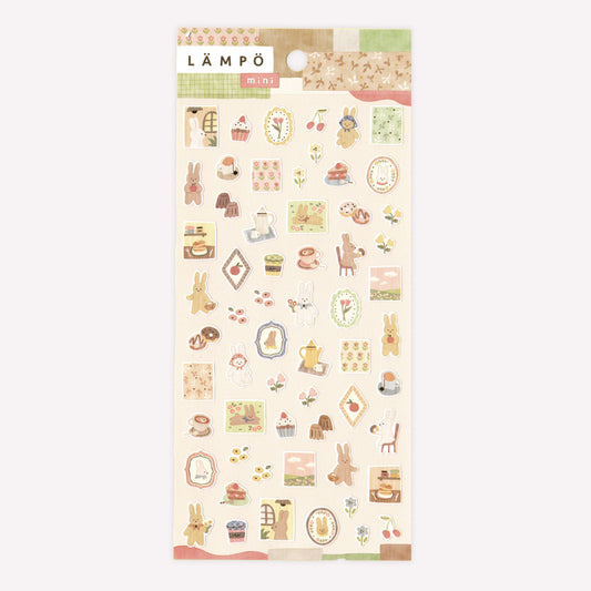 Mind Wave Lämpö sheet of decorative stickers featuring mini designs of rabbits baking and eating in the park with floral details. 