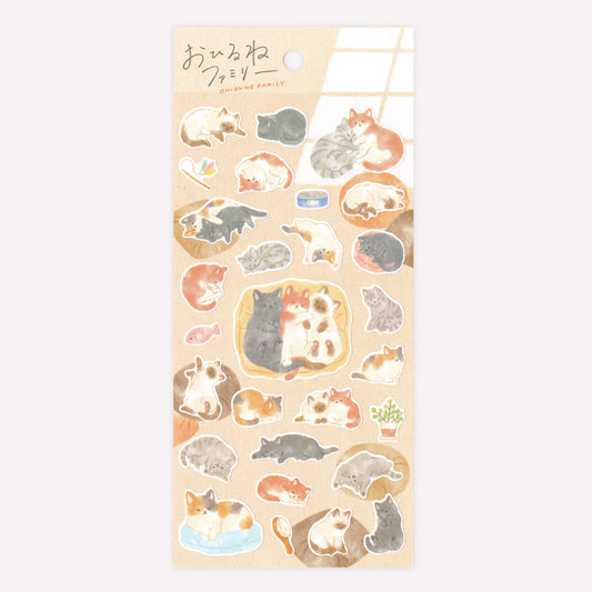 Mindwave Ohirune Family Kitten Sticker sheet featuring sleepy illustrated cats napping on pillows on a soft beige background.