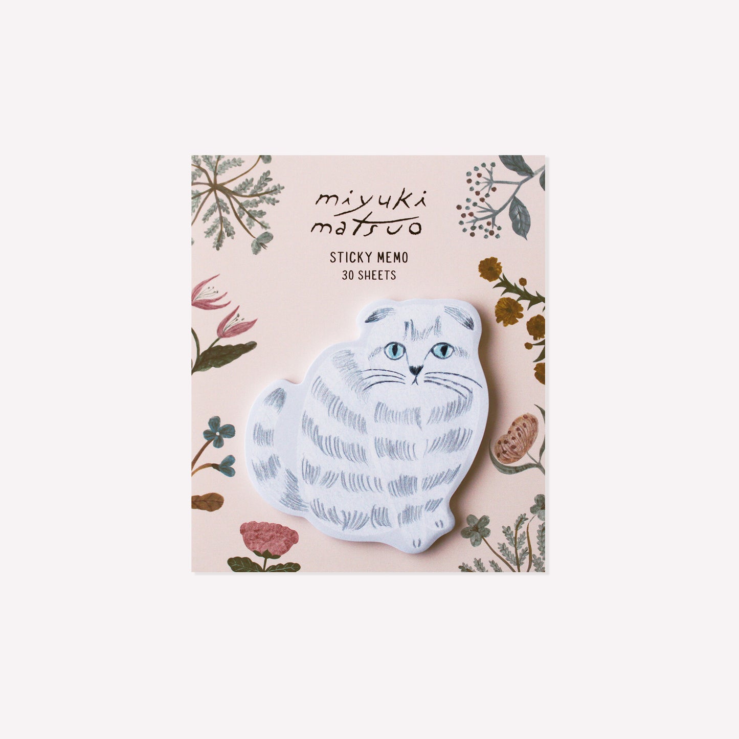 Amy cat shaped die cut sticky memo pad presented on a purple floral background. 