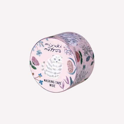 Miyuki Matsuo roll of masking tape with floral and "Amy" cat design on a on a pink background. 