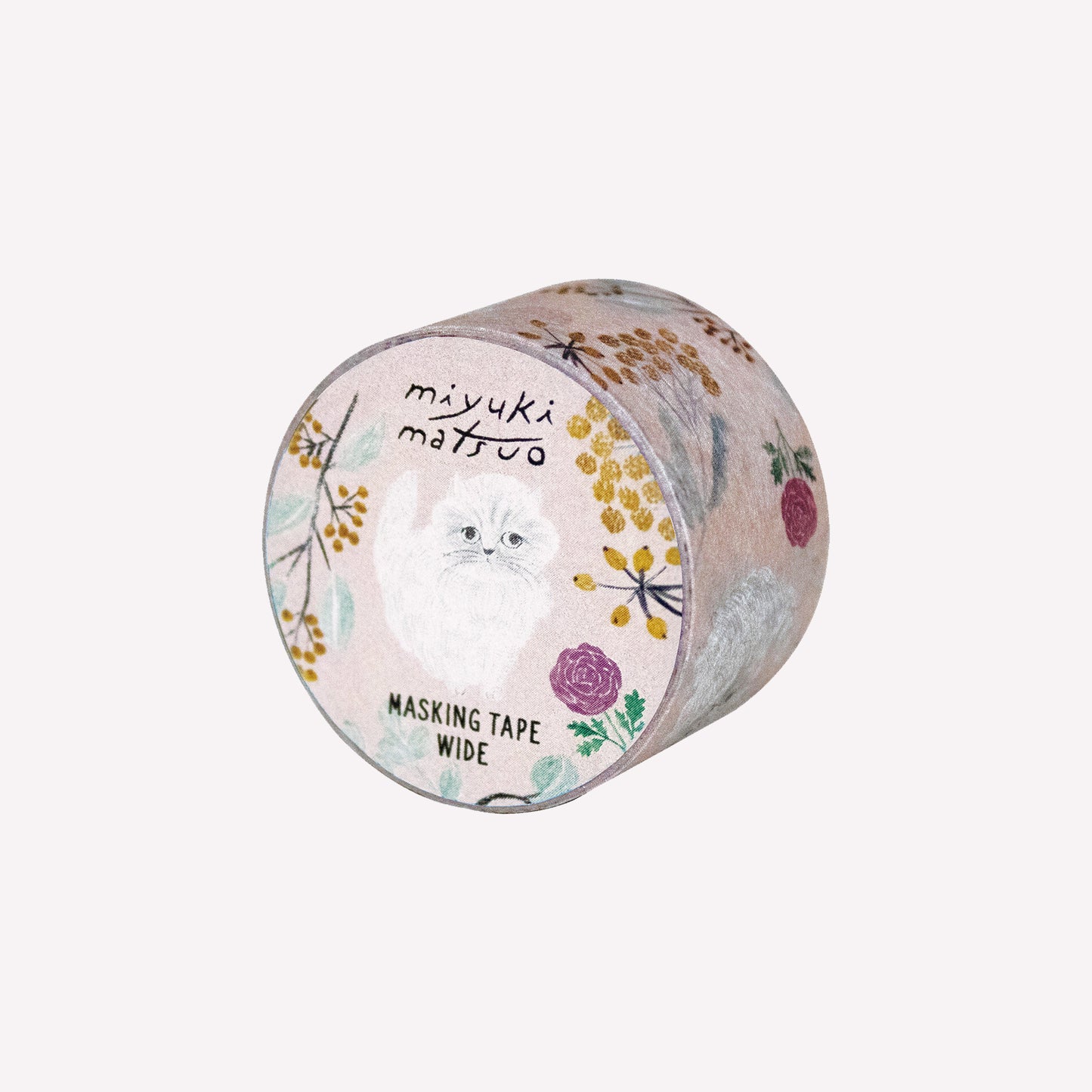 Miyuki Matsuo roll of masking tape with floral and cat design on a on a peach background. 
