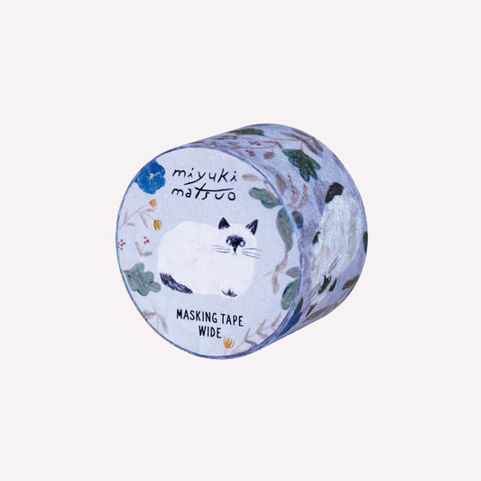 Miyuki Matsuo roll of masking tape with floral and "Repos" cat design on a on a purple background. 