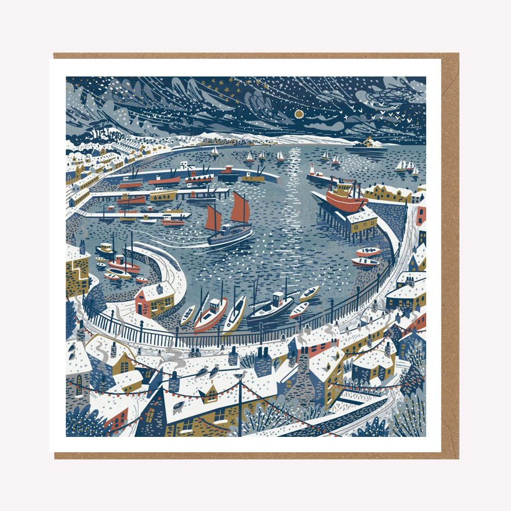 An illustrated greetings card by Matt Johnson, featuring his 'Newlyn in the Snow' Christmas artwork. The square card is paired with a kraft brown envelope.