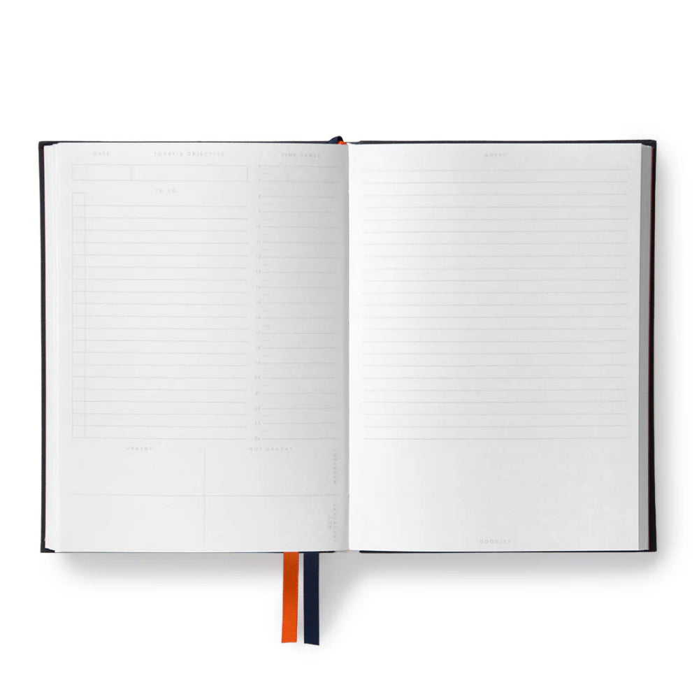 Inside the undated daily planner by Ohh Deer, with space for your to-do list, schedule and objectives on one side and a lined space for notes on the other.