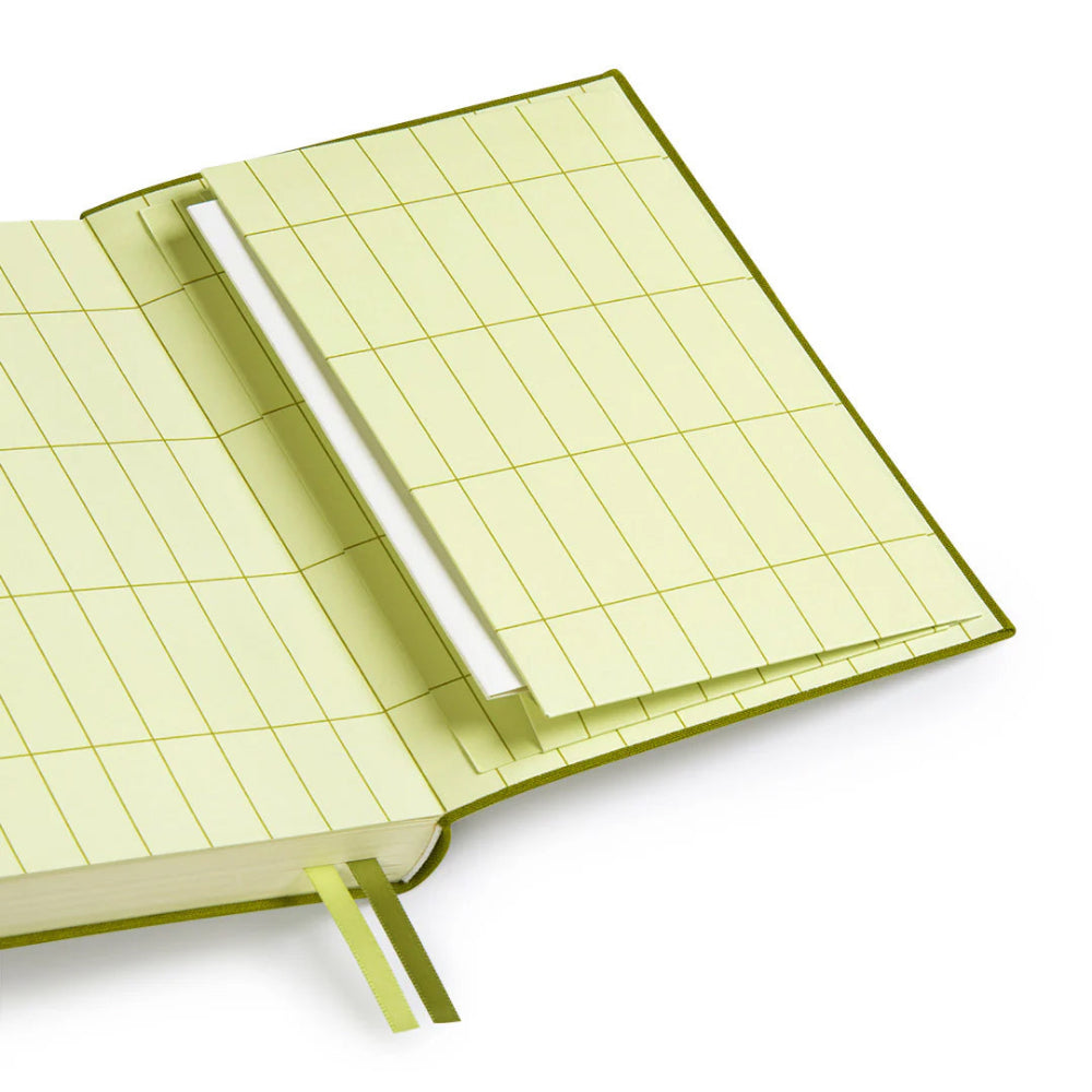 The back pages of Ohh Deer's olive green daily planner, with a light green gridded pattern and a pocket for important documents.