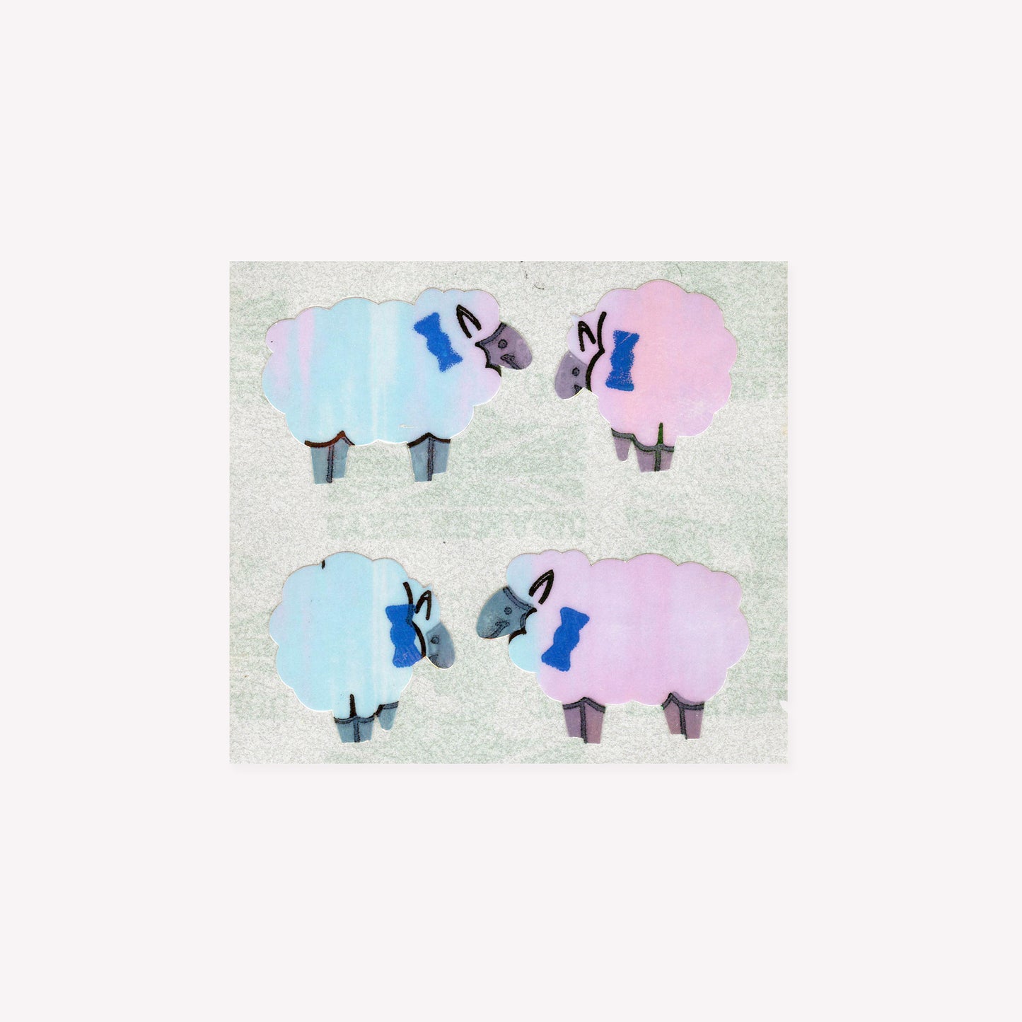 Four pearlie, shiny sheep stickers on a mini sticker sheet from Stickermagic.