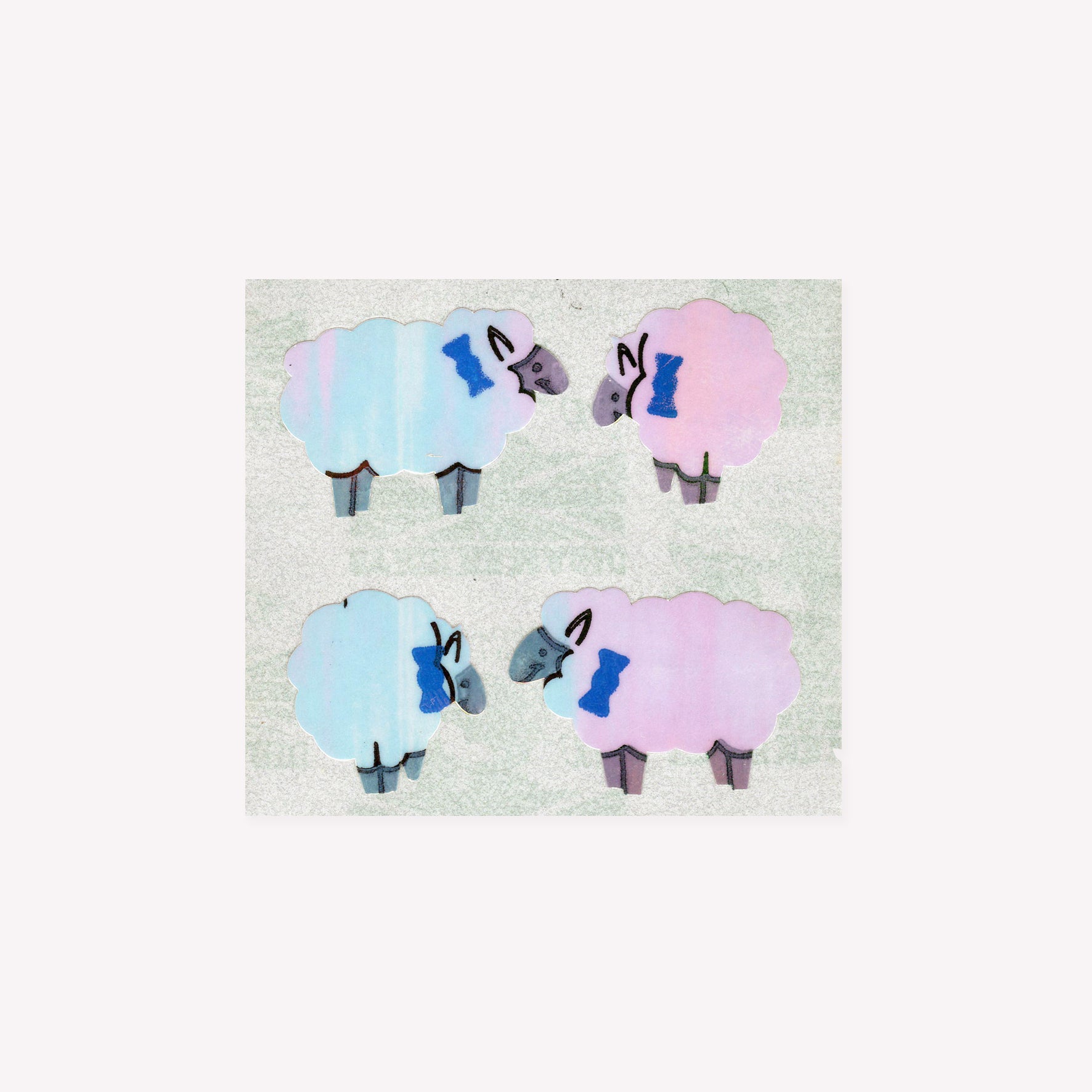 Four pearlie, shiny sheep stickers on a mini sticker sheet from Stickermagic.