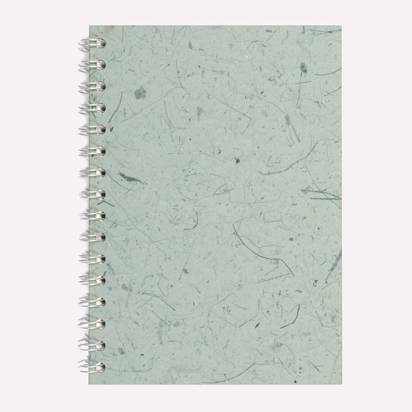 A5 sized Pink Pig Spiral bound sketchbook, with a textured seafoam green Thai banana leaf tissue paper cover and brown cartridge paper inside.