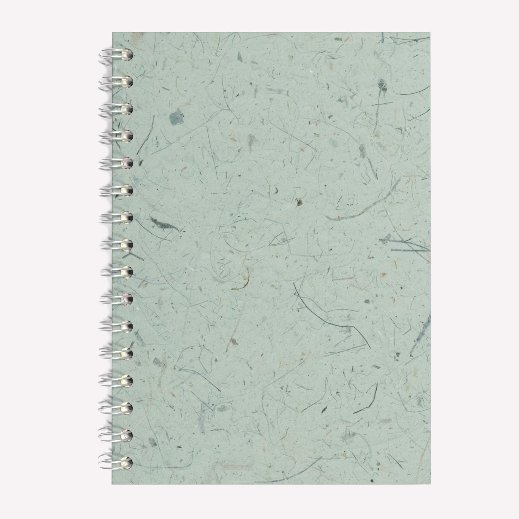 A5 sized Pink Pig Spiral bound sketchbook, with a textured seafoam green Thai banana leaf tissue paper cover and brown cartridge paper inside.