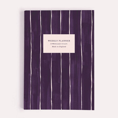 A weekly planner notebook by Sister Paper Co, illustrated with a dark navy pinstripe pattern.