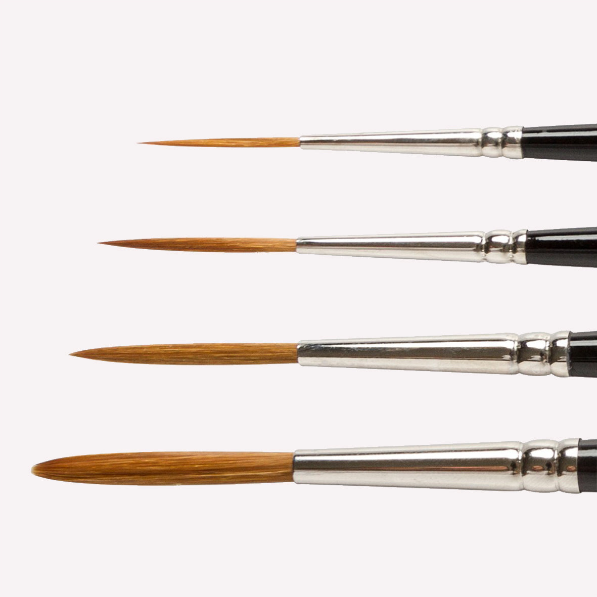Pro Arte’s Prolene rigger 103 paintbrush series in sizes 0 to 6 . Brushes have long synthetic bristles, an ergonomic  black handle and a silver ferrule. 