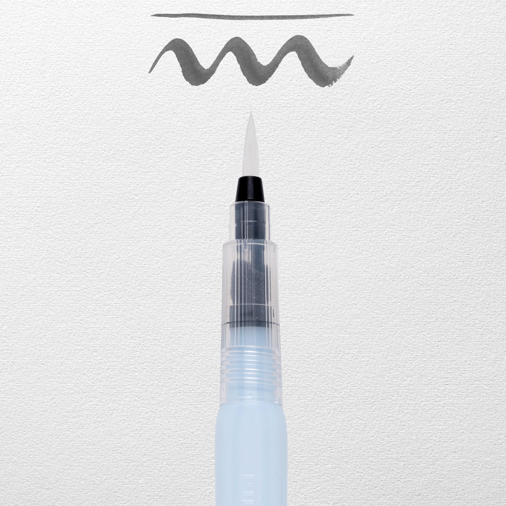 The Van Gogh Reservoir watercolour brush, featuring soft synthetic bristles in a round shape. Image shows example brush strokes. 
