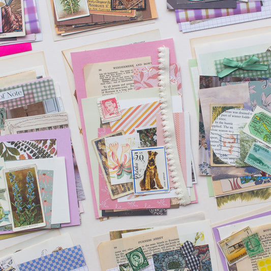 A collection of collaging, junk journalling and scrapbooking paper ephemera scrap packs by Salt Art Supply. Each pack includes coloured and patterned papers, vintage illustrated tea cards, stickers and stamps.