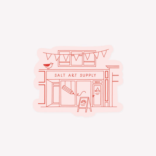 Illustrated, die-cut paper sticker of the Salt Art Supply shop, drawn in red with a pink background.