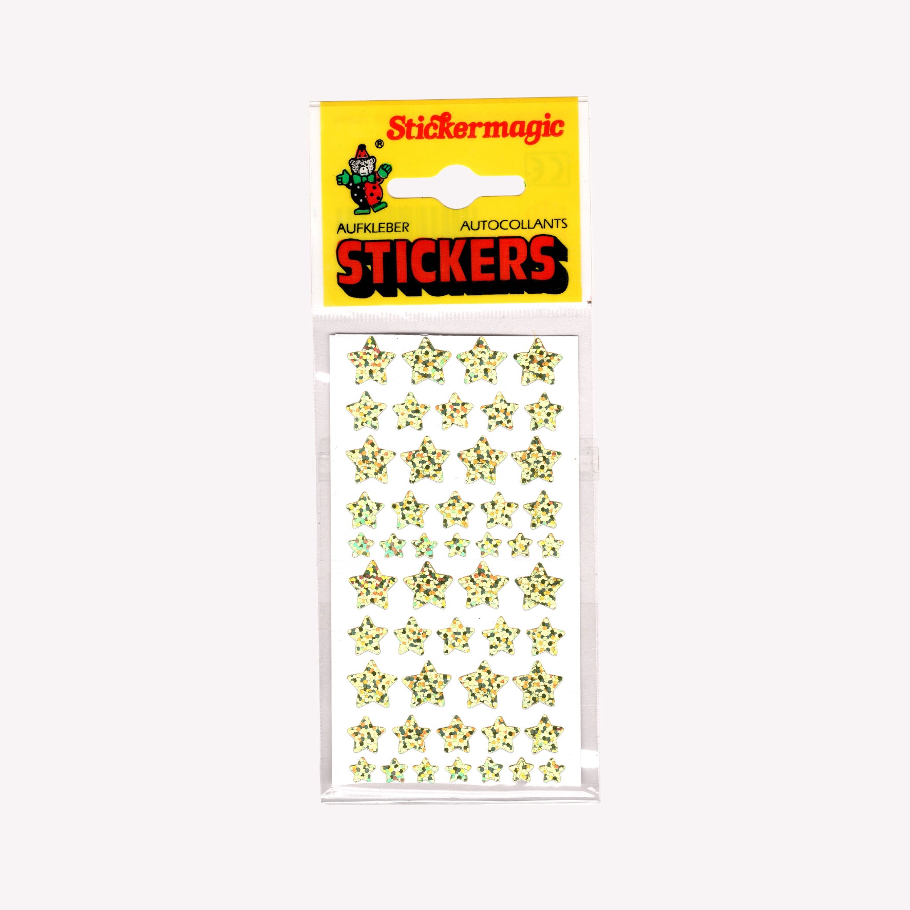 Stickermagic set of 2 primsatic sparkly gold star sticker sheets, packed with a yellow vintage label. 