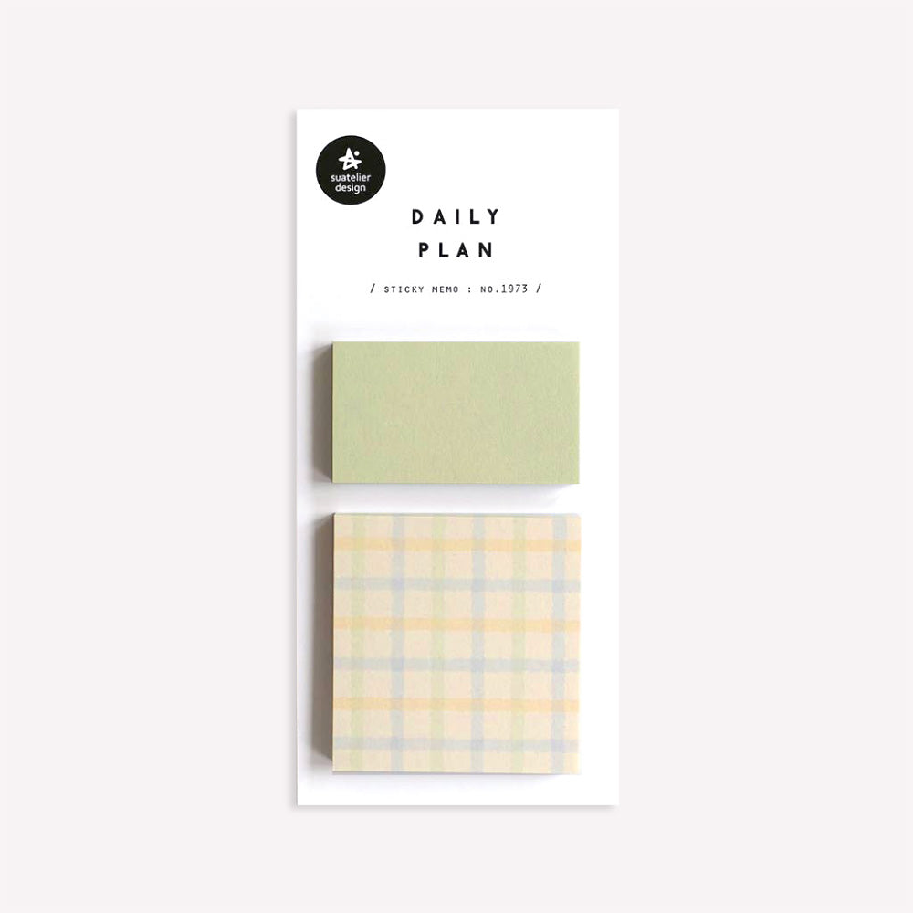 Daily plan memo notes no. 1973 by Suatelier. This pack of sticky memo notes includes two designs, one plain green and one with a pastel yellow and green gingham check pattern.