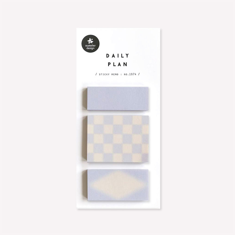 Daily plan memo notes no. 1974 by Suatelier. This pack of sticky memo notes includes three designs, one plain blue, one in blue with a white diamond and one with a blue and white check pattern.