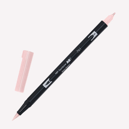 Tombow ABT Dual brush pen in Carnation Pink (761) with open caps showing a fine tip for details and a brush tip for expressive marks.
