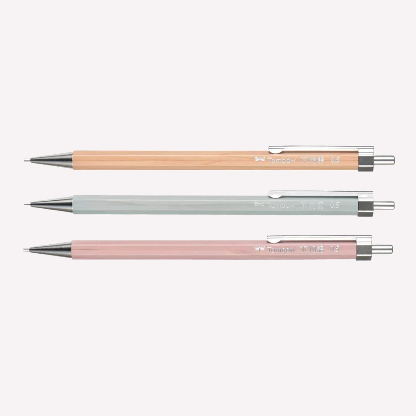 Tombow Kimonogatari wooden barrel 0.5mm mechanical pencil available in natural wood, nemophila blue and lilac pink with a sturdy metal clip. 