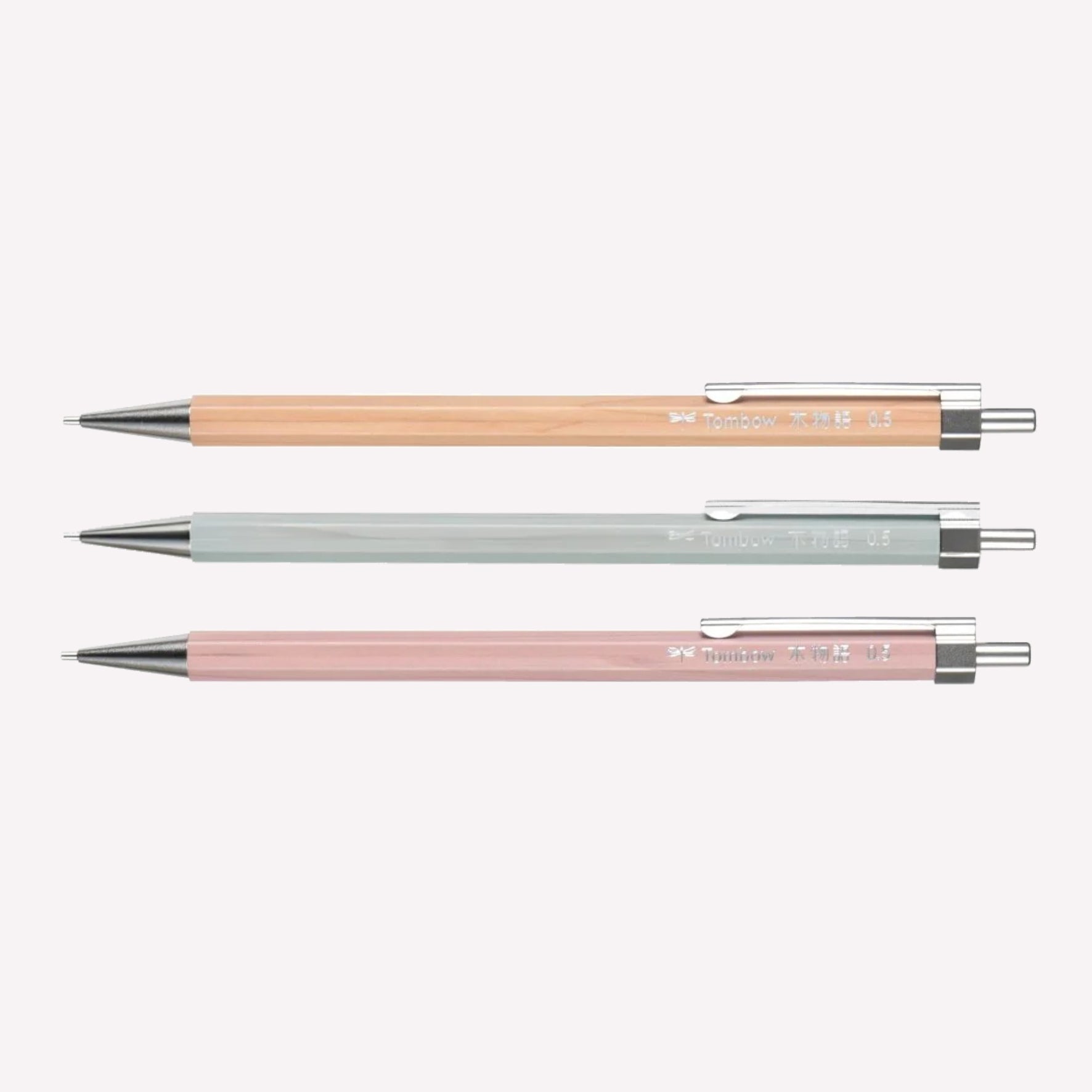 Tombow Kimonogatari wooden barrel 0.5mm mechanical pencil available in natural wood, nemophila blue and lilac pink with a sturdy metal clip. 