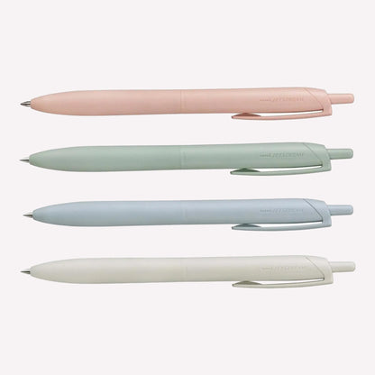 Uni Jetstream Lite Touch gel pens on a white background available in coral pink, sage green, light blue and shell white. 