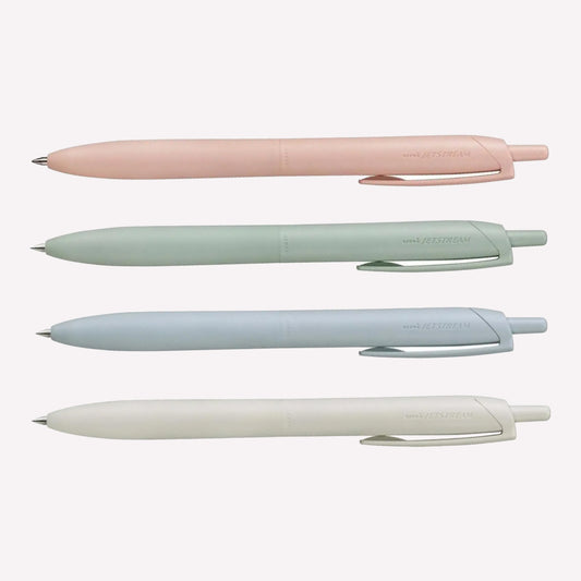 Uni Jetstream Lite Touch gel pens on a white background available in coral pink, sage green, light blue and shell white. 