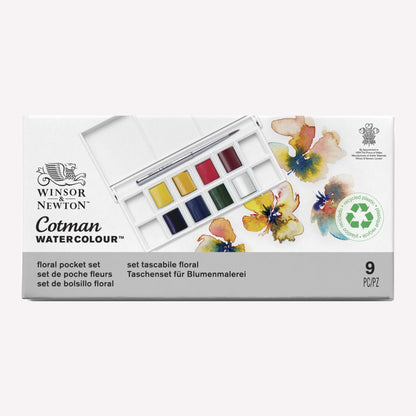 Cotman Watercolour Floral pocket set, presented in packaging that shows the 8 half pans included, alongside examples of botanical work you can create using this set. 