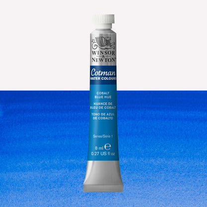 Winsor & Newton Cotman watercolour paint packaged in 8ml silver tubes with a white lid in the shade Cobalt Blue Hue over a highly pigmented colour swatch.