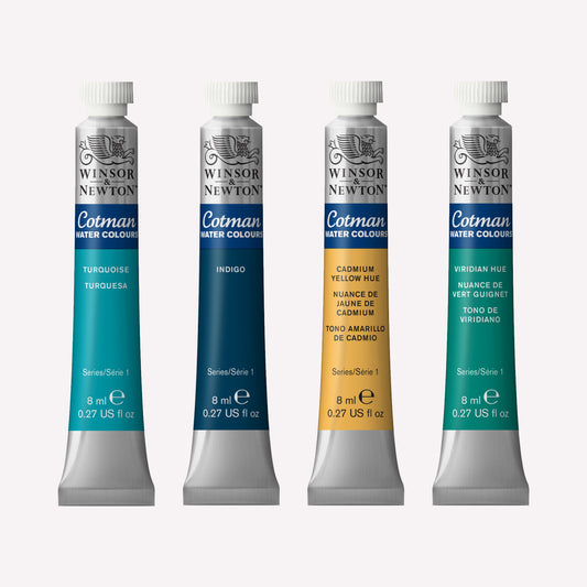 A set of four Winsor & Newton Cotman watercolour paint packaged in 8ml silver tubes with a white lid. The featured colours include Turquoise, Indigo, Cadmium Yellow Hue and Viridian Hue. 