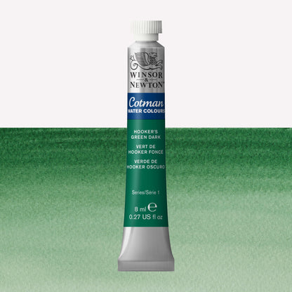 Winsor & Newton Cotman watercolour paint packaged in 8ml silver tube with a white lid in the shade Hooker’s Green Dark over a highly pigmented colour swatch.