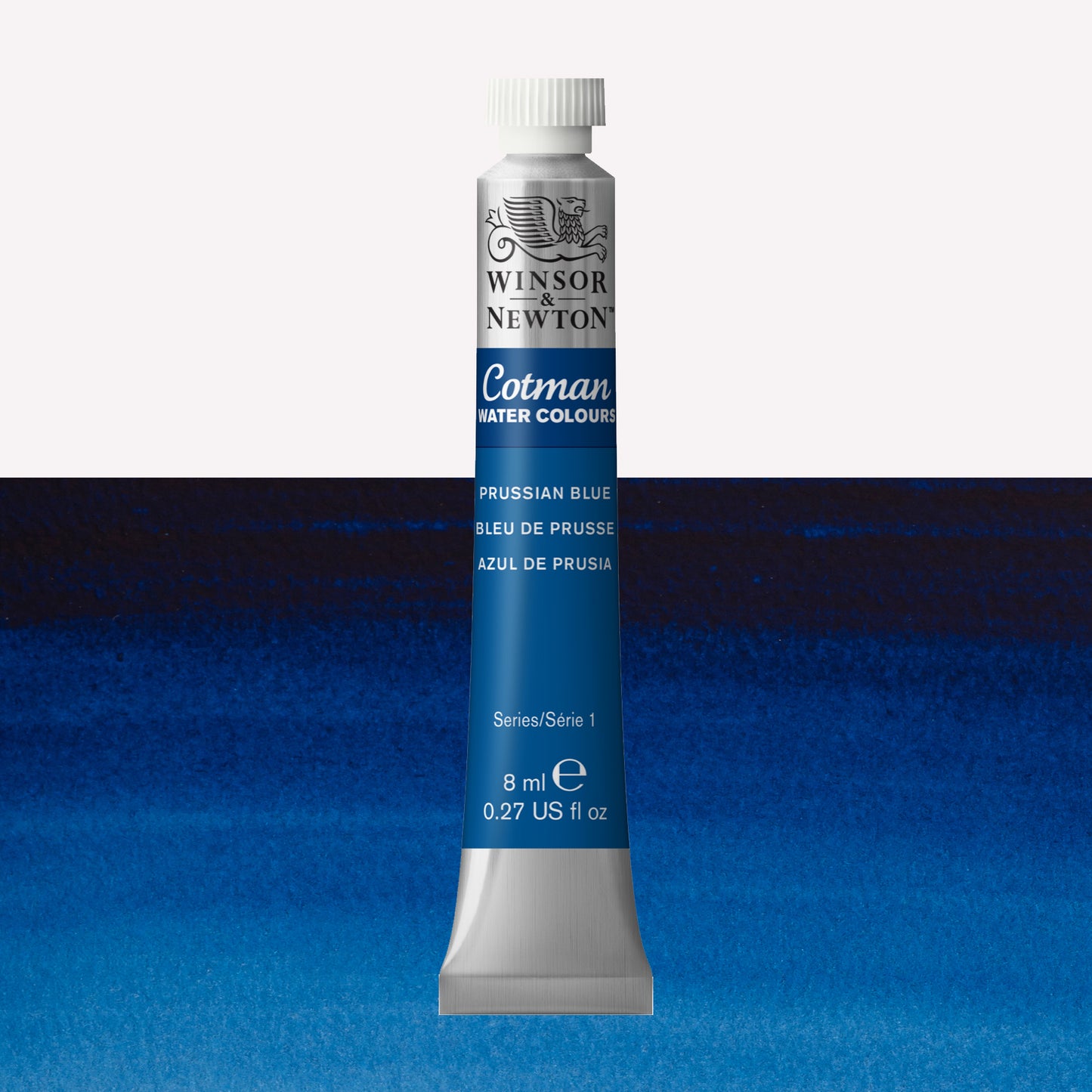 Winsor & Newton Cotman watercolour paint packaged in 8ml silver tube with a white lid in the shade Prussian Blue over a highly pigmented colour swatch.