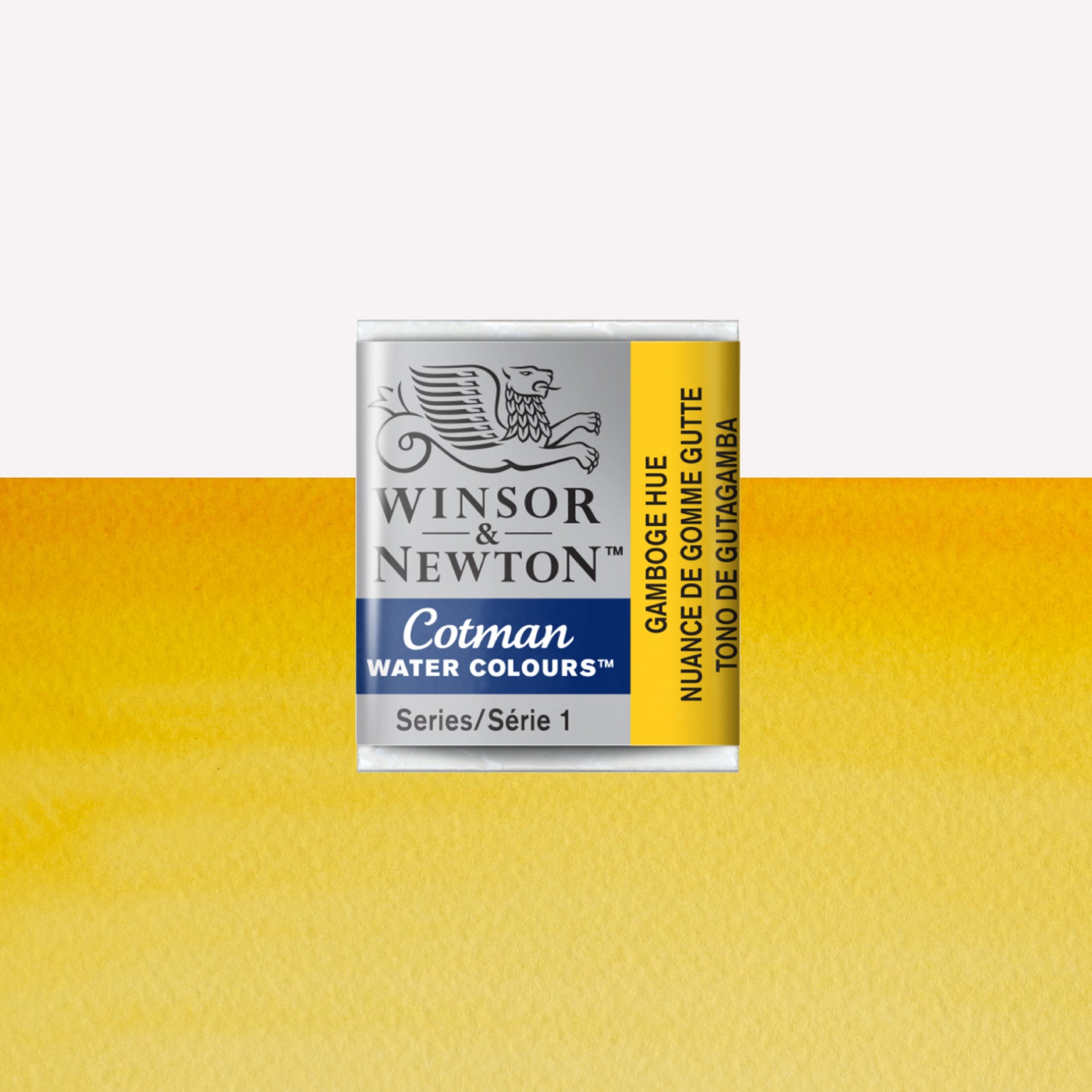 Winsor & Newton Cotman watercolour half pan in the shade Gamboge Hue over a vibrant colour swatch. These half pans have a solid formula and are packaged in compressed paint cake. 