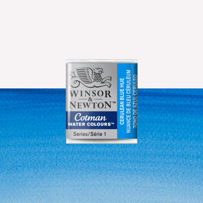 Winsor & Newton Cotman watercolour half pan in the shade Cerulean Blue Hue over a vibrant colour swatch. These half pans have a solid formula and are packaged in compressed paint cake. 