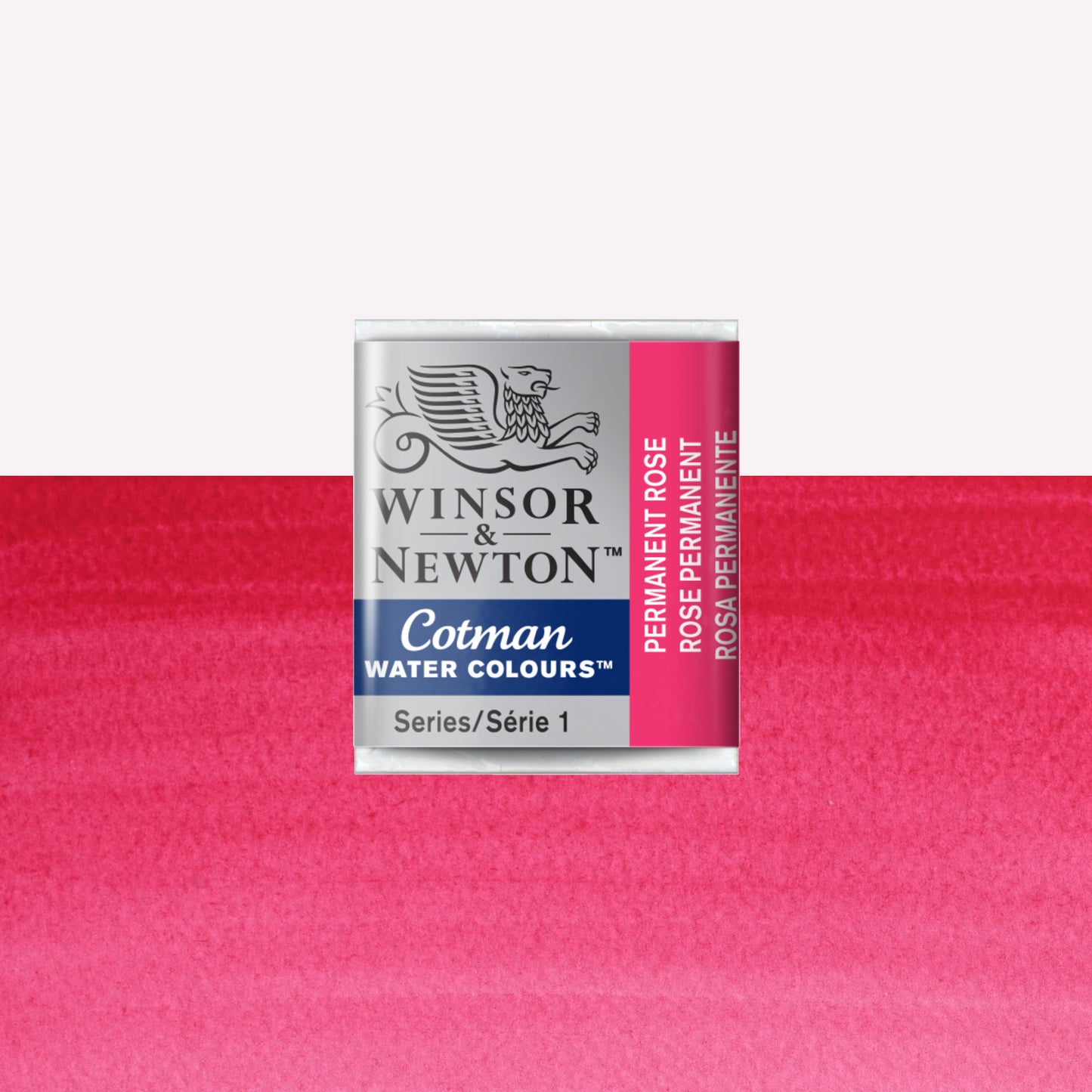 Winsor & Newton Cotman watercolour half pan in the shade Permanent Rose over a vibrant colour swatch. These half pans have a solid formula and are packaged in compressed paint cake. 