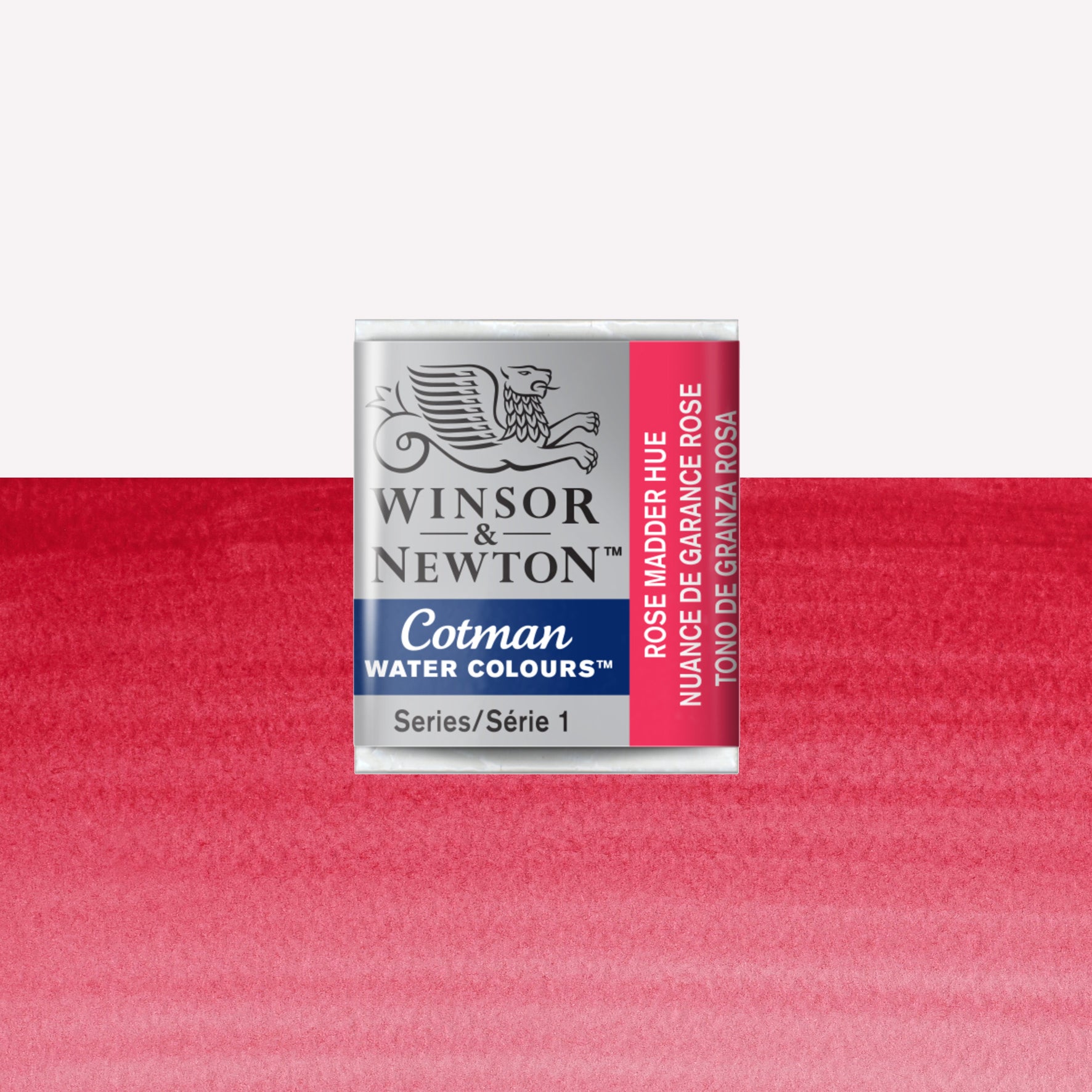 Winsor & Newton Cotman watercolour half pan in the shade Rose Madder Hue over a vibrant colour swatch. These half pans have a solid formula and are packaged in compressed paint cake. 