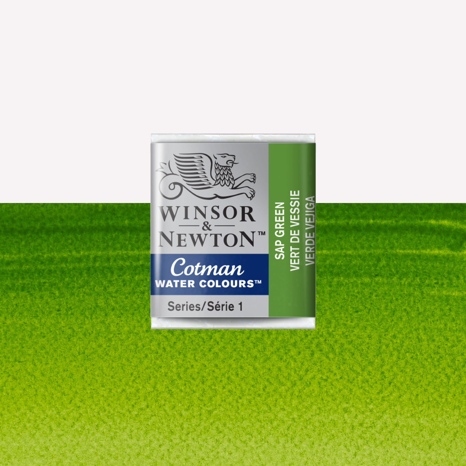 Winsor & Newton Cotman watercolour half pan in the shade Sap Green over a vibrant colour swatch. These half pans have a solid formula and are packaged in compressed paint cake. 