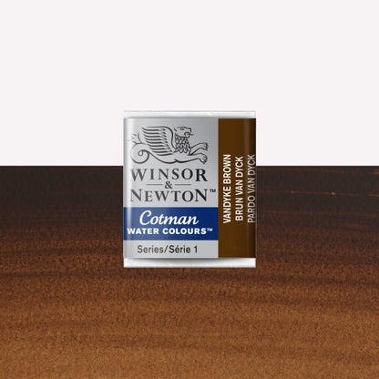 Winsor & Newton Cotman watercolour half pan in the shade Vandyke Brown over a vibrant colour swatch. These half pans have a solid formula and are packaged in compressed paint cake. 