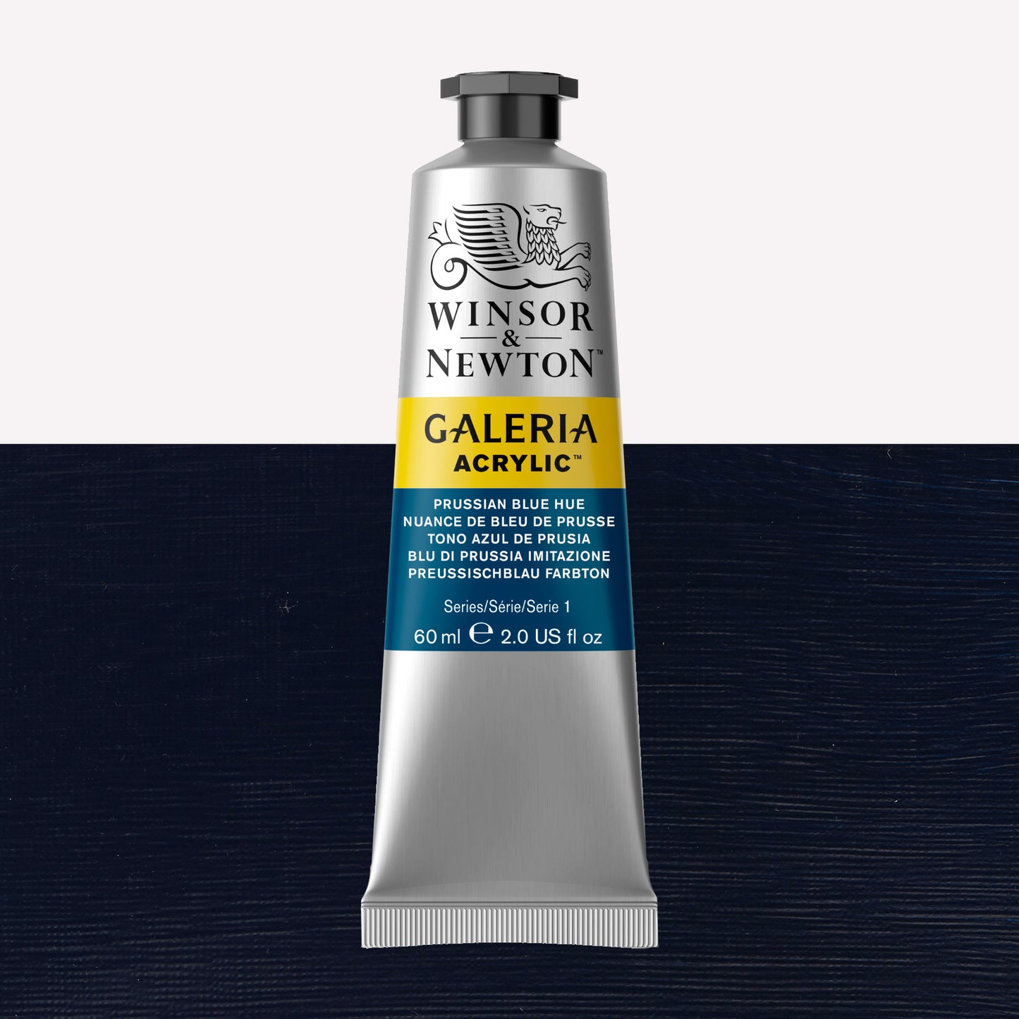 A 60ml tube of vibrant Galeria Acrylic paint in the shade Prussian Blue. This professional-quality paint is packaged in a silver tube with a black lid. Made by Winsor and Newton.