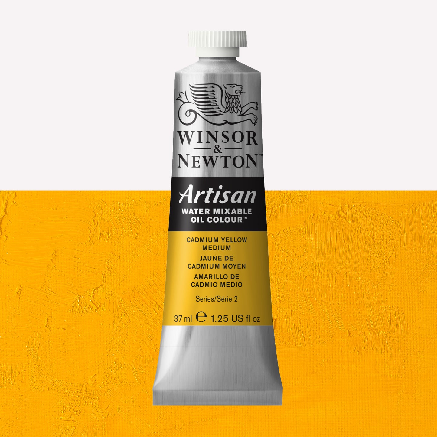 A 37ml silver tube of Winsor & Newton, Artisan Water Mixable Oil Colour in the shade Cadmium Yellow Medium, over a beautifully pigmented colour swatch. 