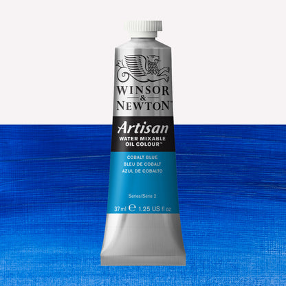 A 37ml silver tube of Winsor & Newton, Artisan Water Mixable Oil Colour in the shade Cobalt Blue, over a beautifully pigmented colour swatch. 