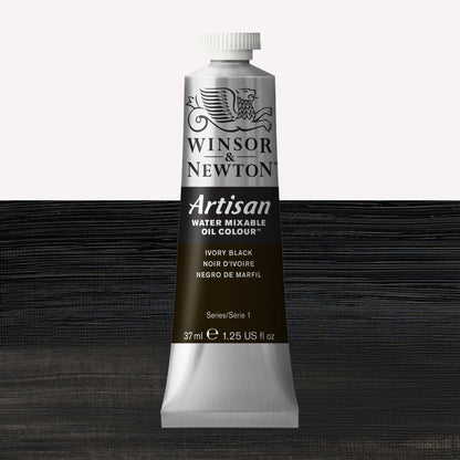A 37ml silver tube of Winsor & Newton, Artisan Water Mixable Oil Colour in the shade Ivory Black, over a beautifully pigmented colour swatch. 