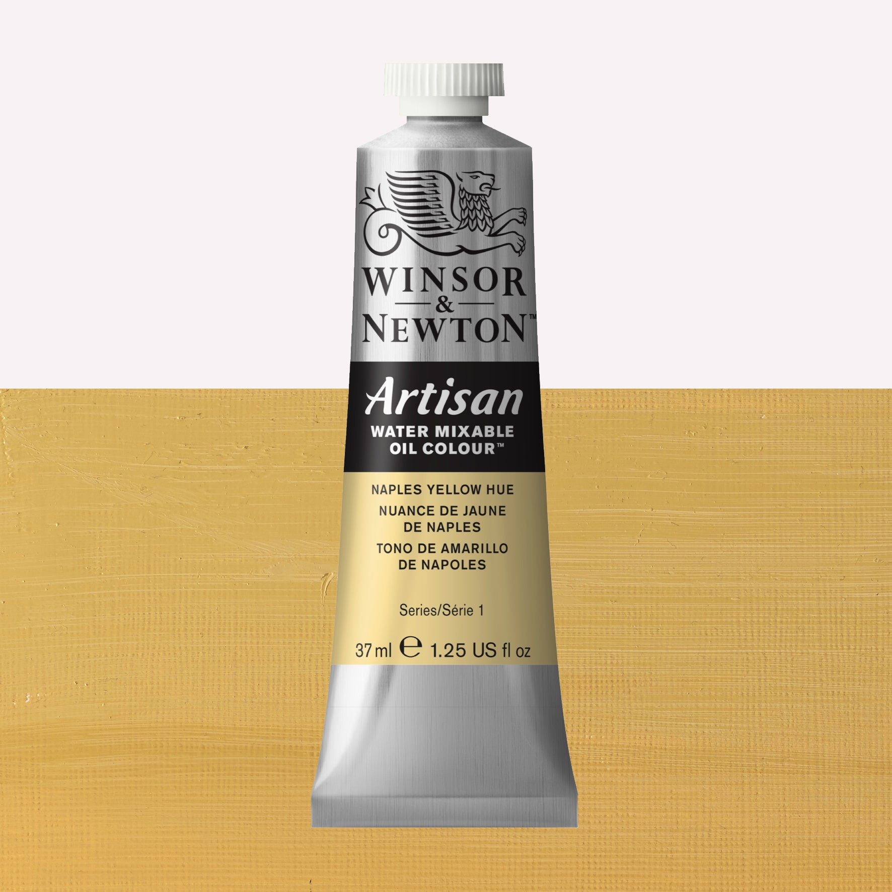 A 37ml silver tube of Winsor & Newton, Artisan Water Mixable Oil Colour in the shade Naples Yellow, over a beautifully pigmented colour swatch. 