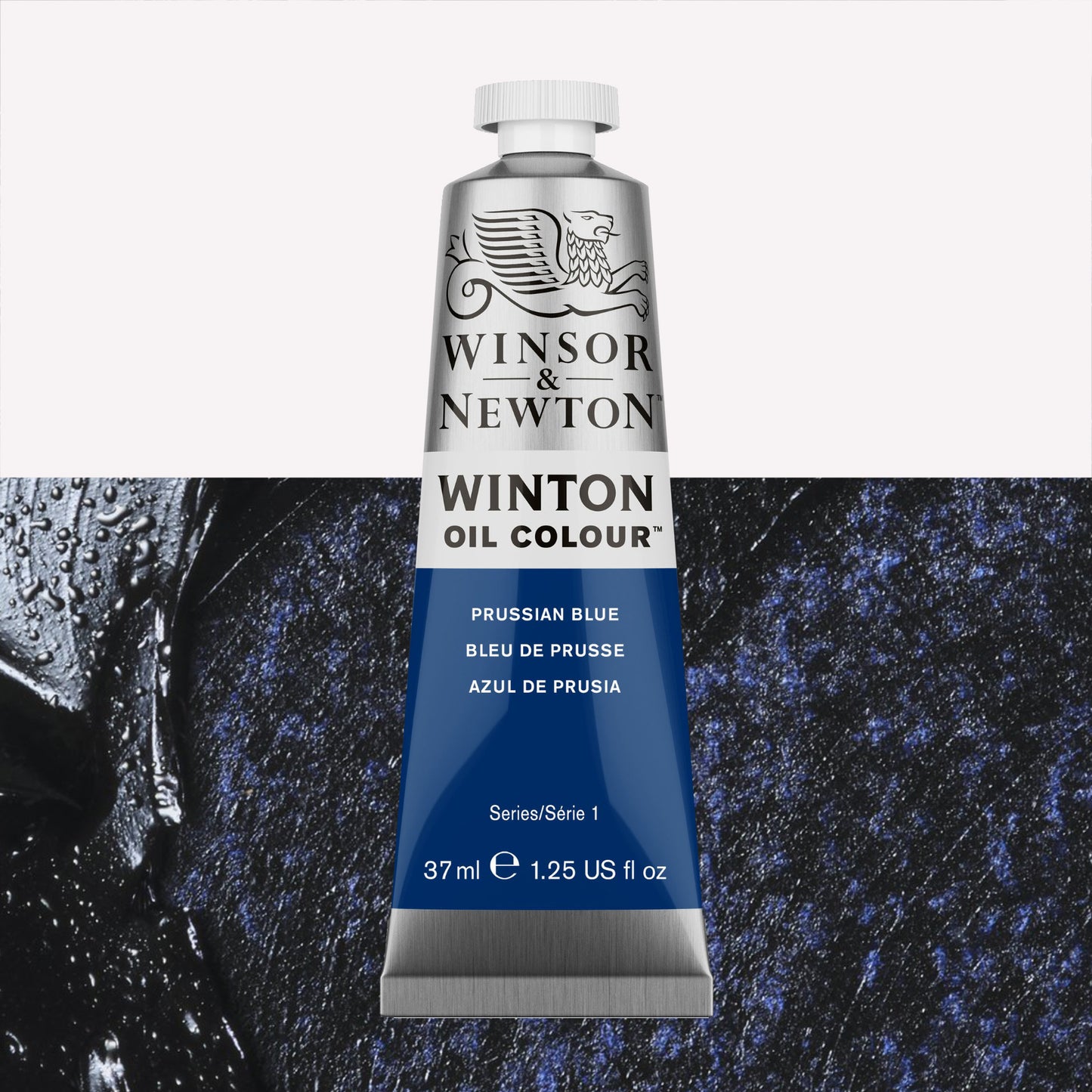 A 37ml silver tube of Winsor & Newton, Winton Oil Paint in the shade Prussian Blue, over a beautifully pigmented colour swatch. 